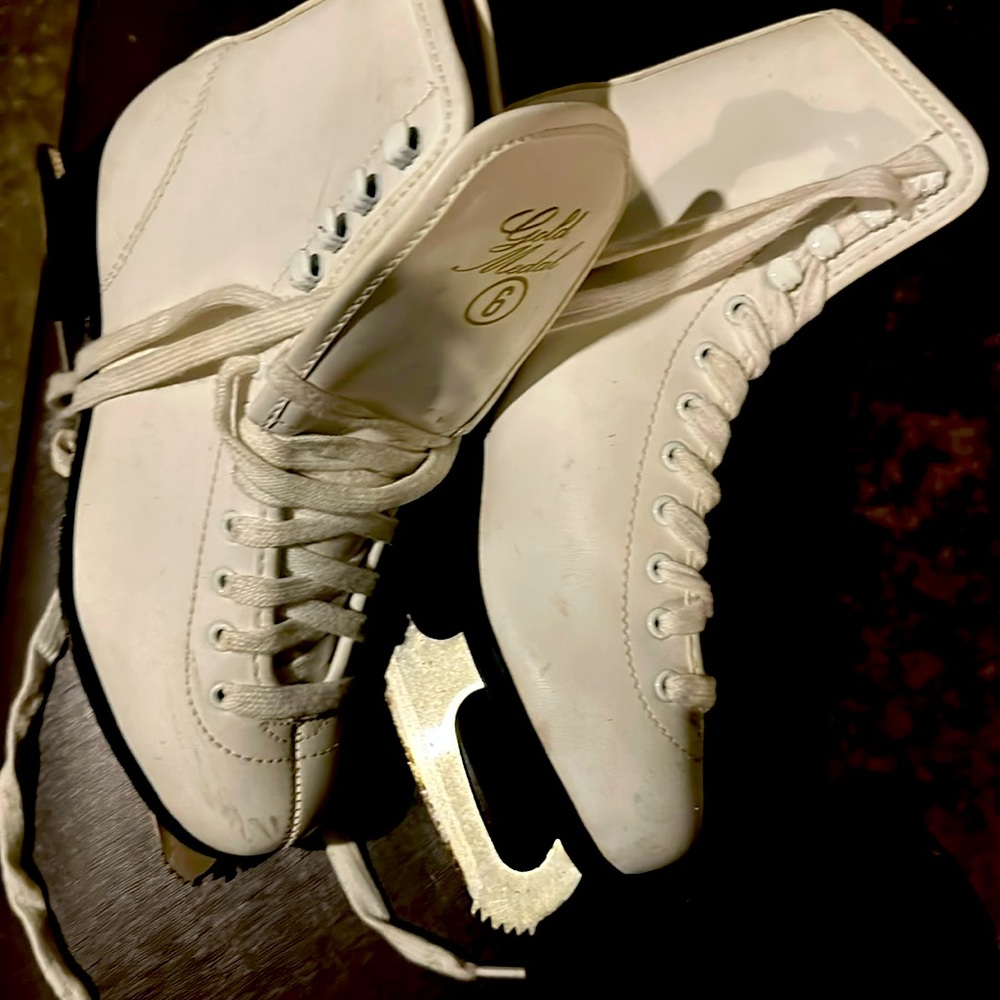 Womens white gold medal size 6 ice skates . Clean